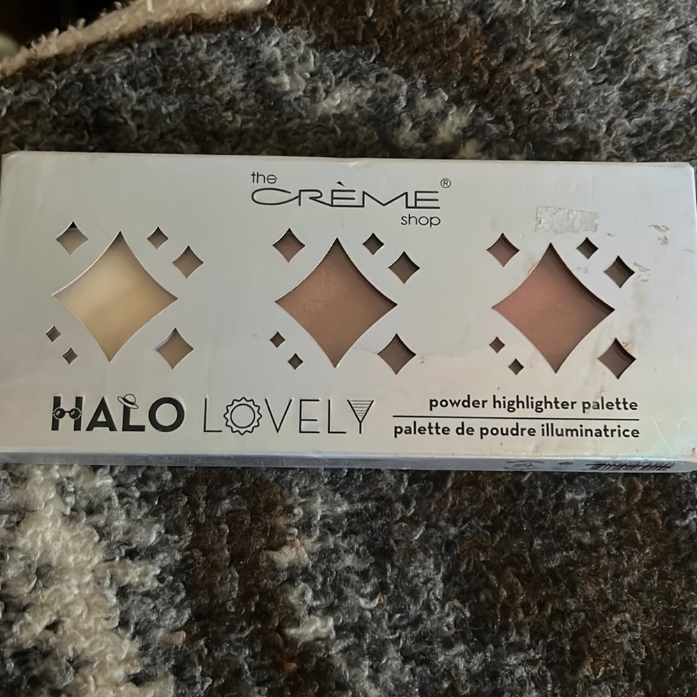 The creme shop powder highlighter palette halo lovely